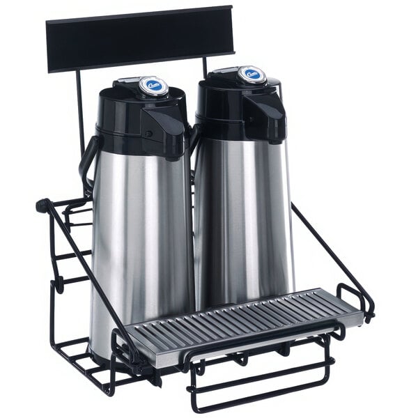 A black Curtis wire rack holding two coffee airpots.