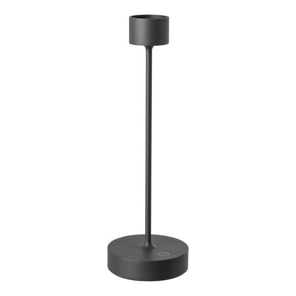 An Abert Saturno black metal table lamp with a round base.