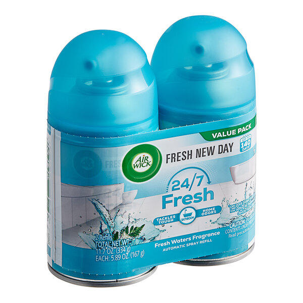 Two blue Air Wick Fresh Waters scented refill canisters with white text.
