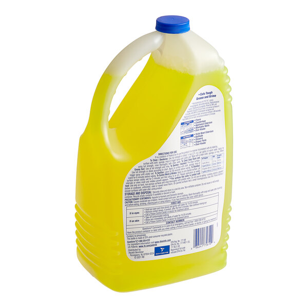 A bottle of Lysol Sparkling Lemon Sunflower Essence Scent yellow liquid.