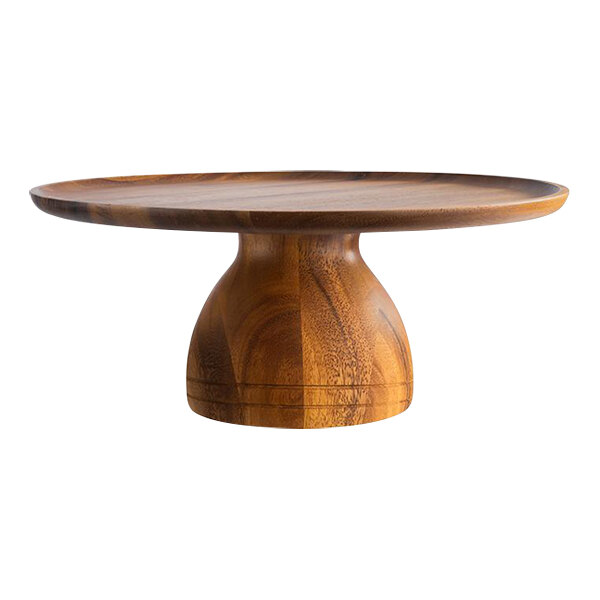 A round wooden APS cake stand.