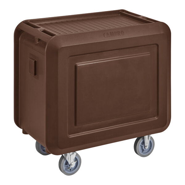 A dark brown Cambro service cart with closed sides and 3 shelves on wheels.