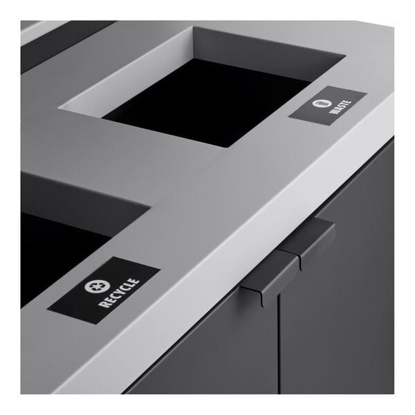 A Lancaster Table & Seating dark gray steel rectangular two-stream decorative waste receptacle with tray shelf.