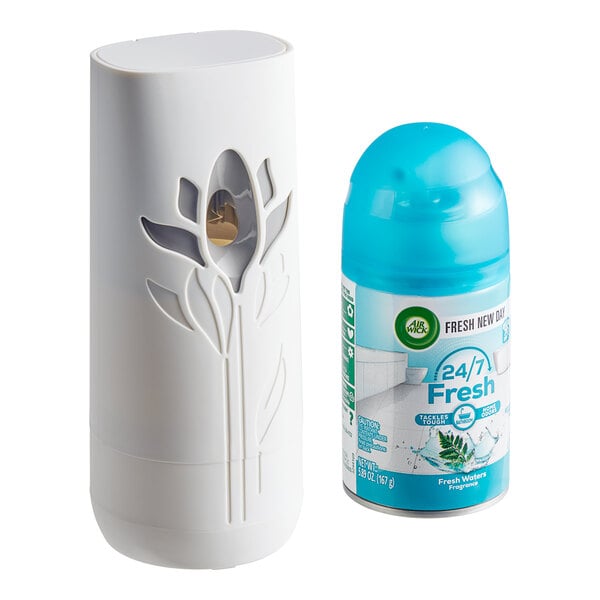 A white Air Wick Freshmatic air freshener next to a blue Fresh Waters refill can.