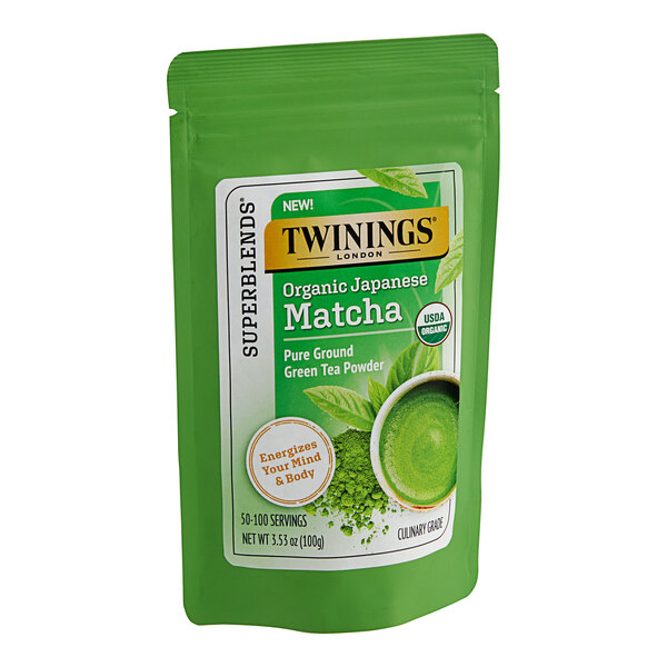 A white and green Twinings bag of organic matcha tea powder.
