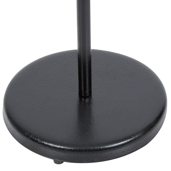 A black metal stand with a black pole.