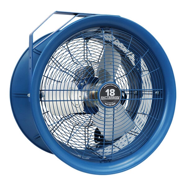 A close-up of a blue Patterson industrial fan with a metal blade.