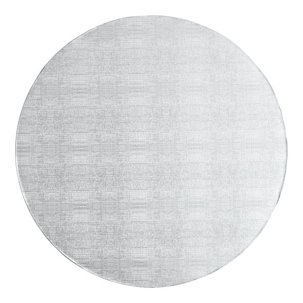 A silver round Baker's Lane cake drum with a pattern on it.