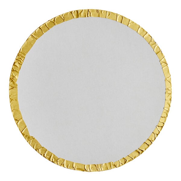 A round white and gold plate with a gold foil surface.