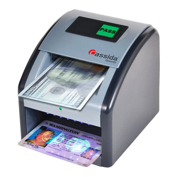 A Cassida D-OID Omni-ID 2-in1 money scanner detecting a stack of bills.
