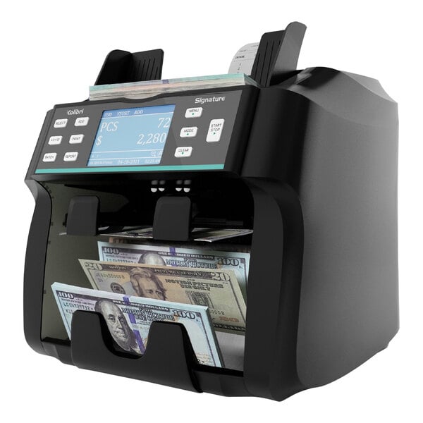 A black Kolibri bill counting machine with cash on the screen.