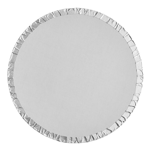 A round silver cake drum with a white background and silver edge.