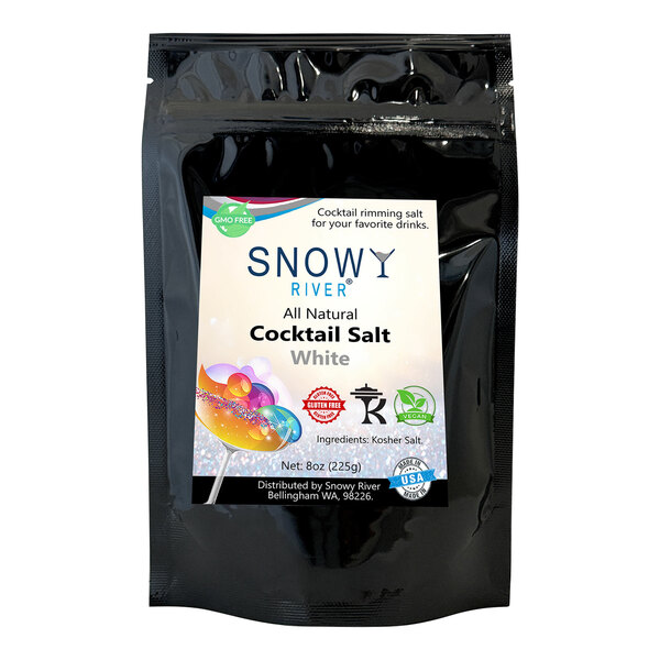 A black packet of Snowy River white cocktail salt with a white label with colorful text and images.