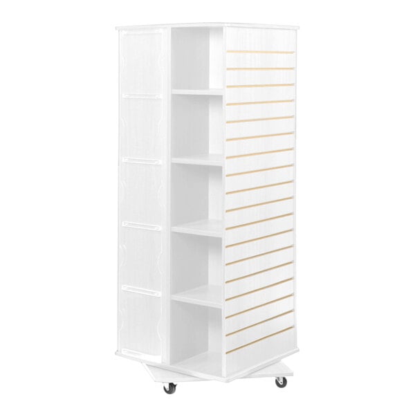 A white rectangular wood mobile spinner display with shelves on wheels.