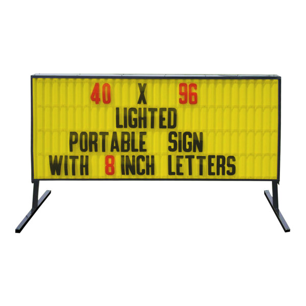 A yellow sign with black text on a black metal pole.