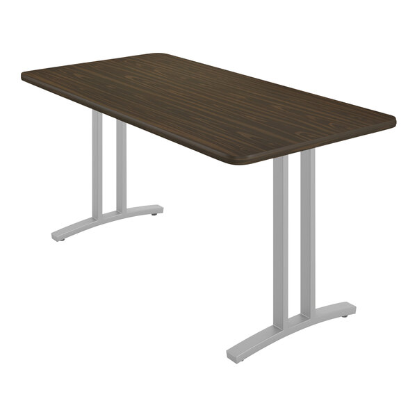 A brown rectangular Correll table with silver metal legs.