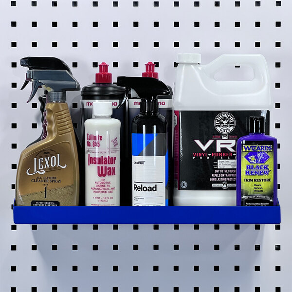 A blue Triton Products steel shelf holding various cleaning products.