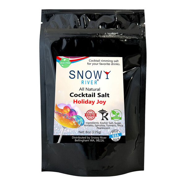 A black package of Snowy River Holiday Joy Cocktail Rimming Salt with a white label.