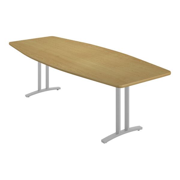 A rectangular Correll conference table with metal legs and a wood board top.