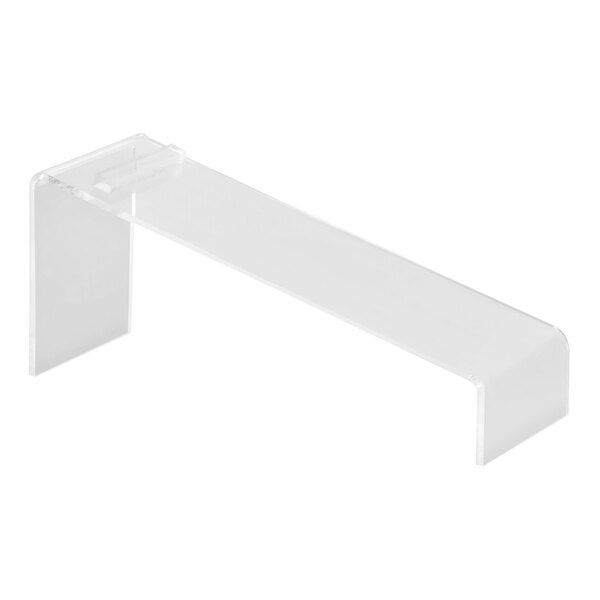 A clear plastic shelf for shoes.