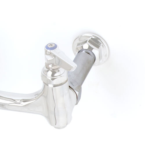 A close-up of a silver T&S faucet bushing extension.