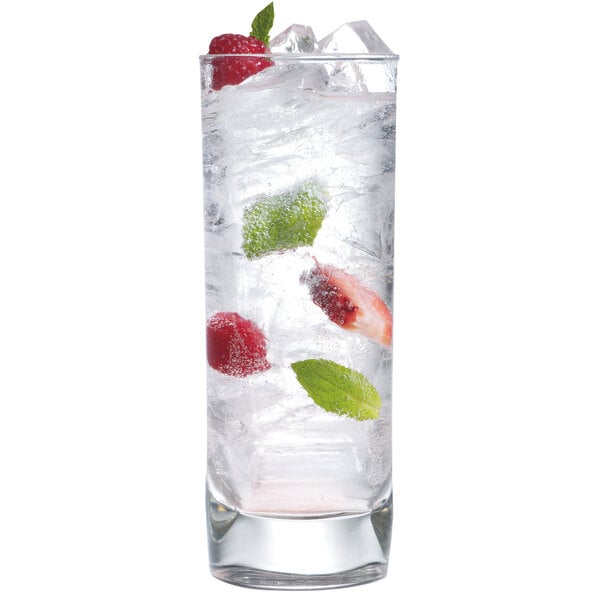 A glass of ice with fruit on a white background.