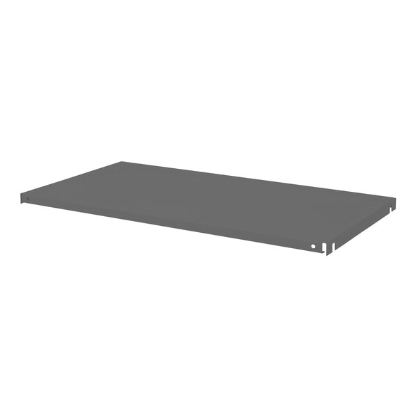 A grey metal Durham Mfg shelf with holes on a white background.