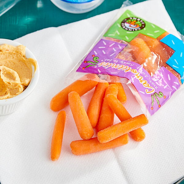 A bag of baby carrots on a white napkin.