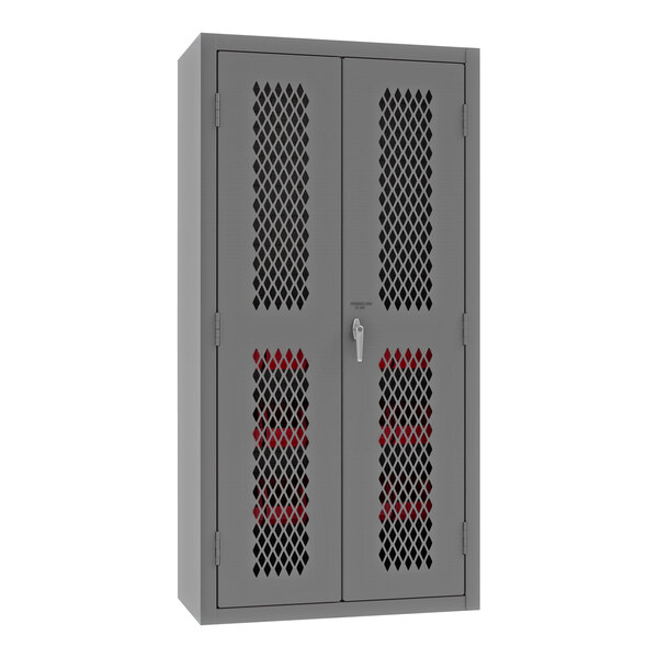 A grey metal storage cabinet with ventilated red doors and grey shelves.