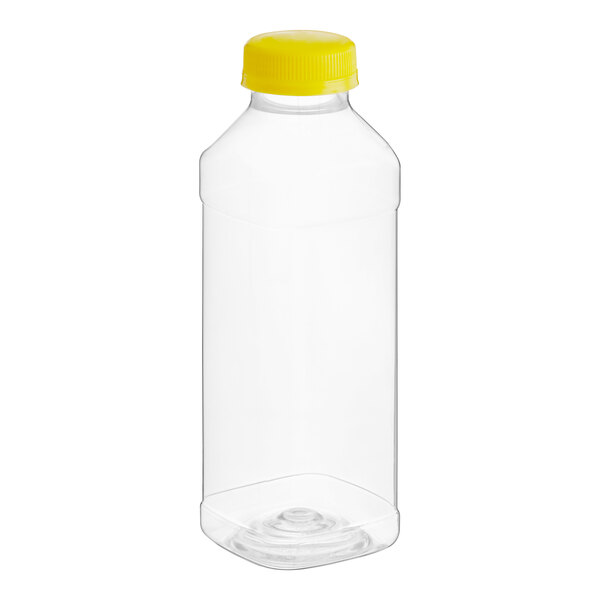 A clear plastic square juice bottle with a yellow lid.