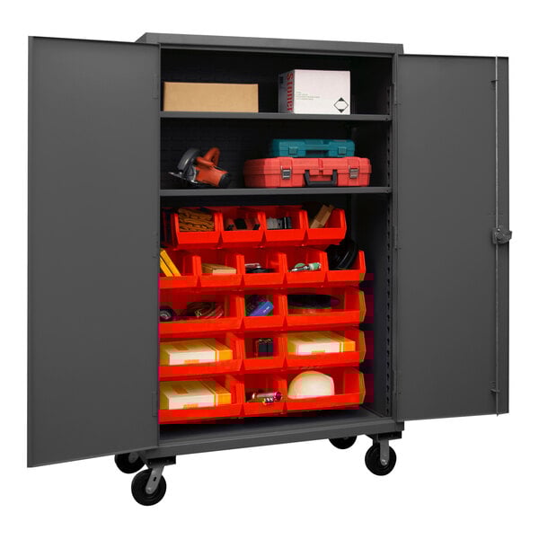 A large metal Durham storage cabinet with red bins.