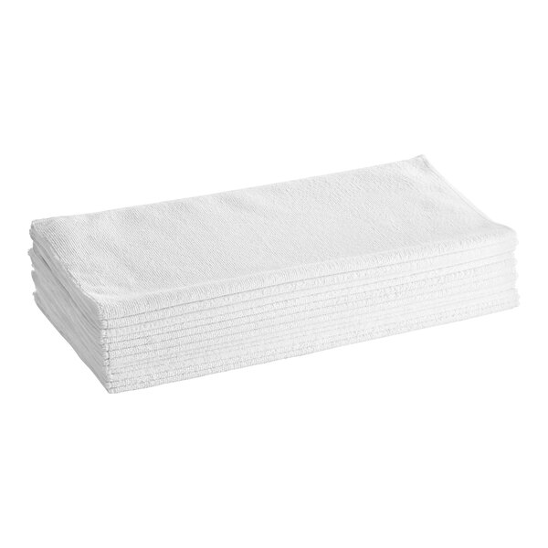 A stack of Lavex white microfiber towels.