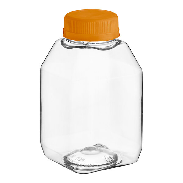 A clear plastic 8 oz. square juice bottle with an orange lid.