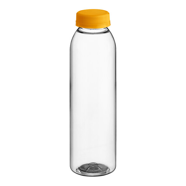 A clear juice bottle with an orange lid.
