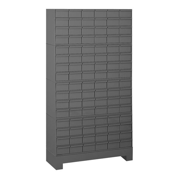 A grey Durham Mfg steel storage cabinet with 96 drawers.