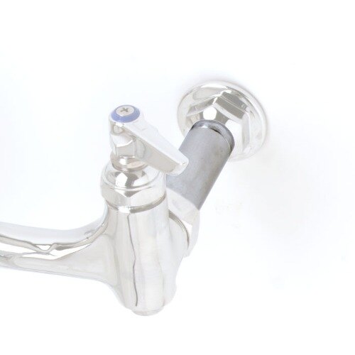 A close-up of a chrome T&S faucet bushing extension.