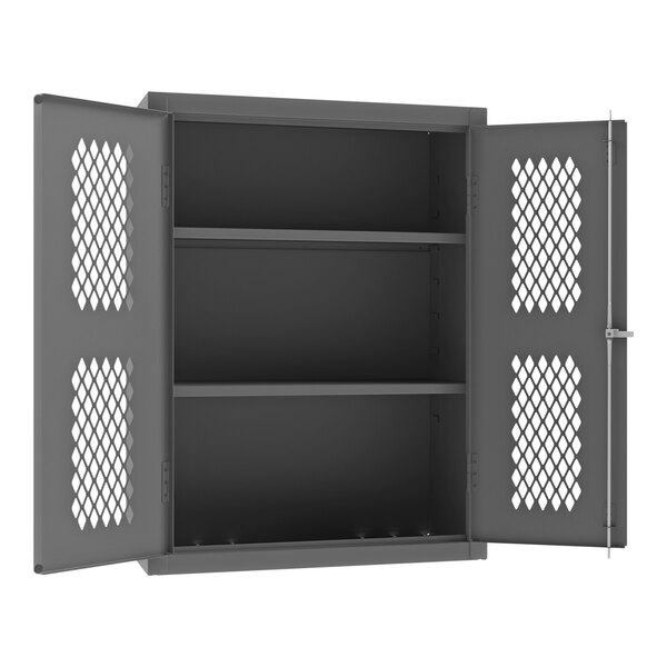 A gray metal cabinet with recessed doors and white diamond-shaped ventilation areas.