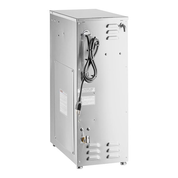 A white Curtis dual voltage hot water dispenser with a power cord attached.