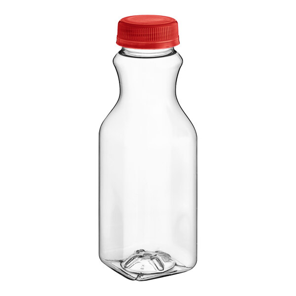 A clear plastic square carafe juice bottle with a red cap.