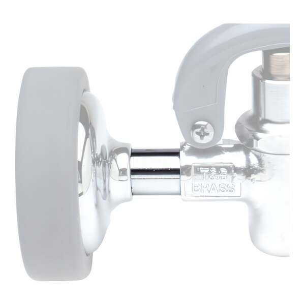 A close-up of a chrome T&S nipple for a faucet with a white handle.
