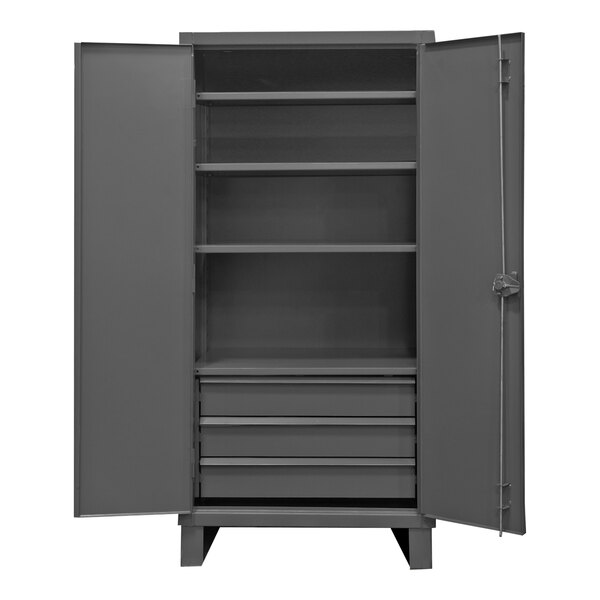 A grey metal Durham storage cabinet with three drawers and shelves.