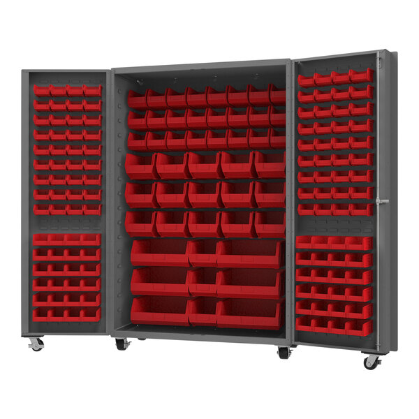 A large gray metal Durham storage cabinet with red bins.