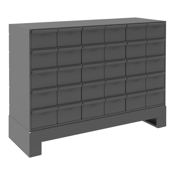 A grey metal Durham storage cabinet with drawers.