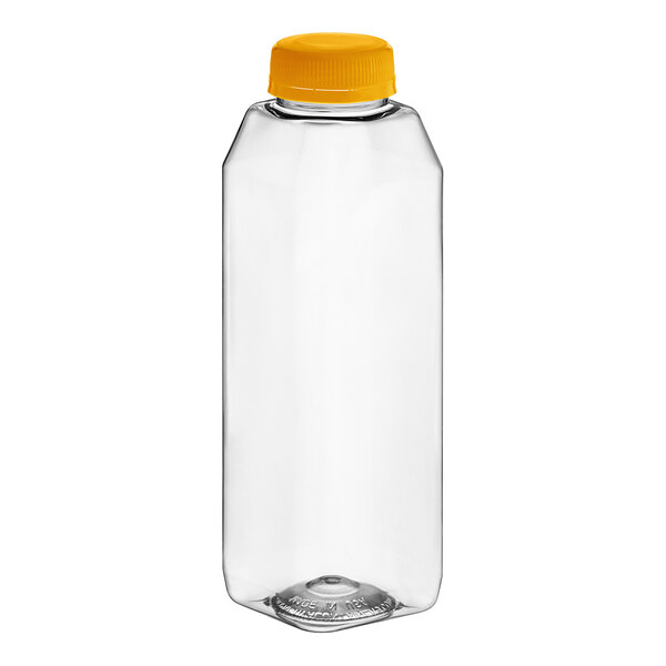 A clear plastic 16 oz. tall square juice bottle with an orange lid.