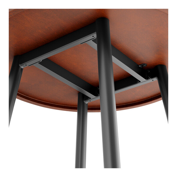 A Lancaster Table & Seating round bar height table with metal legs.