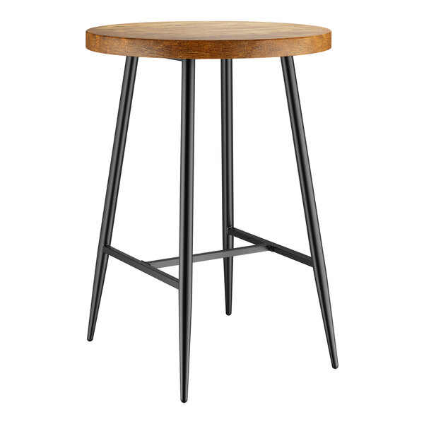 A Lancaster Table & Seating round butcher block table with brown surface and black legs.