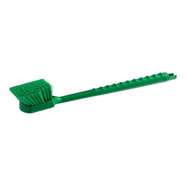 A Lavex green brush with a green plastic handle.