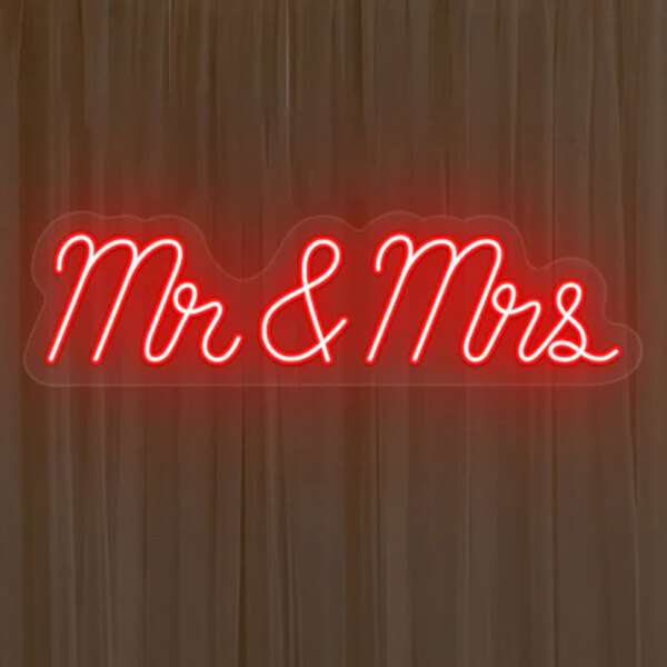 A red neon sign that says "Mr & Mrs" in red and white.