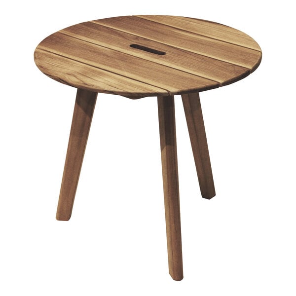 An Outdoor Interiors round teak side table with a wooden top.