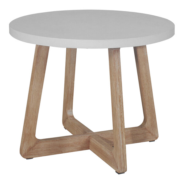 An ivory round table with wooden legs.